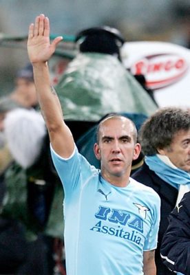 Rome, ITALY:  Lazio's forward Paolo Di Canio gestures towards Lazio fans at his leaves the pitch during the football match opposing Lazio to Juventus at Rome's Olympic stadium 17 December 2005. Lazio captain Di Canio isn't to face a disciplinary hearing over his fascist salute allegedly made last week-end match against Livorno, the Italian football federation (FIGC) said 13 December 2005. AFP PHOTO/ANDREAS SOLARO  (Photo credit should read ANDREAS SOLARO/AFP/Getty Images)